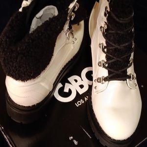 All white GBG boots size 10